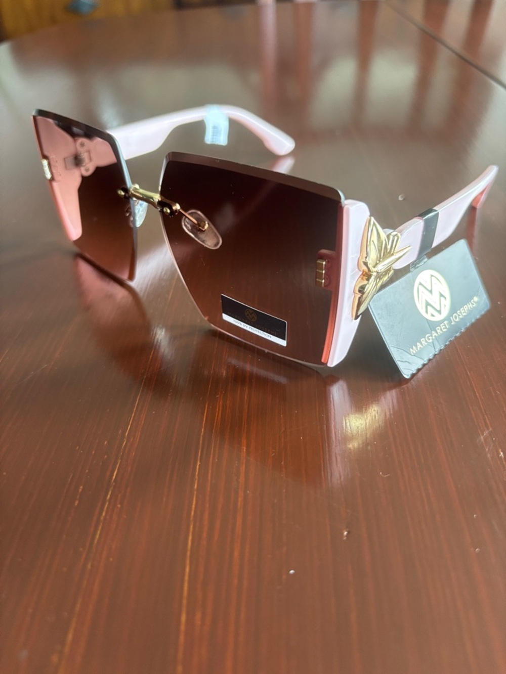 Margaret Josephs 100% UV protect,gradient pink lens,butterfly gold accent arms